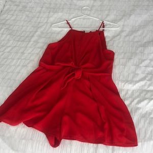 Red romper with tie in front. Never worn - tags still on